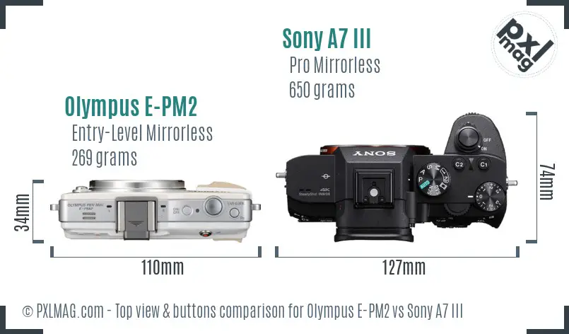 Olympus E-PM2 vs Sony A7 III top view buttons comparison