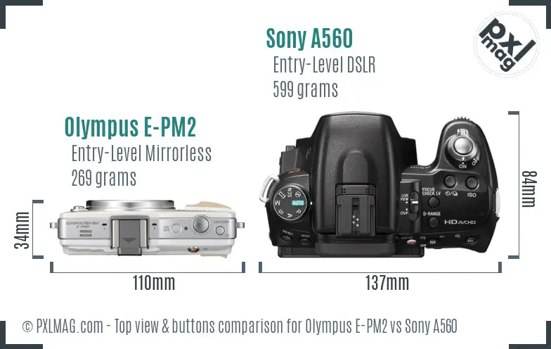 Olympus E-PM2 vs Sony A560 top view buttons comparison Olympus E-PM2 vs Sony A560 top view buttons comparison