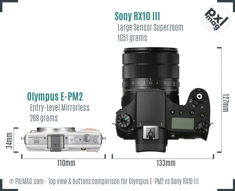 Olympus E-PM2 vs Sony RX10 III top view buttons comparison