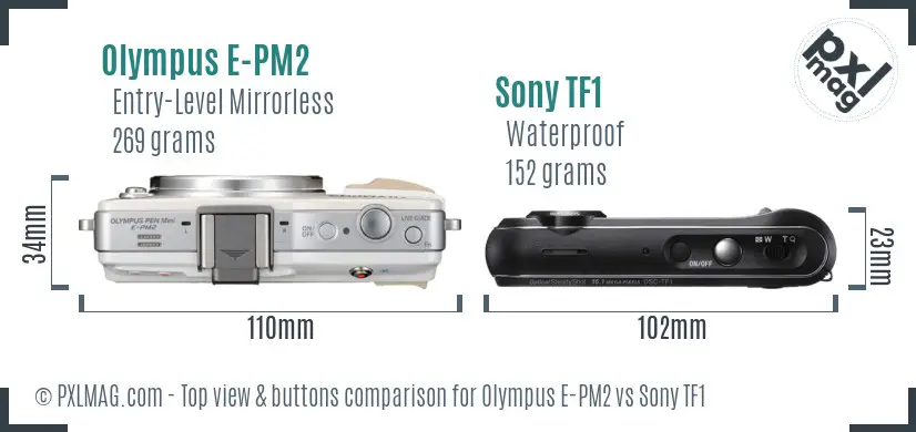 Olympus E-PM2 vs Sony TF1 top view buttons comparison Olympus E-PM2 vs Sony TF1 top view buttons comparison