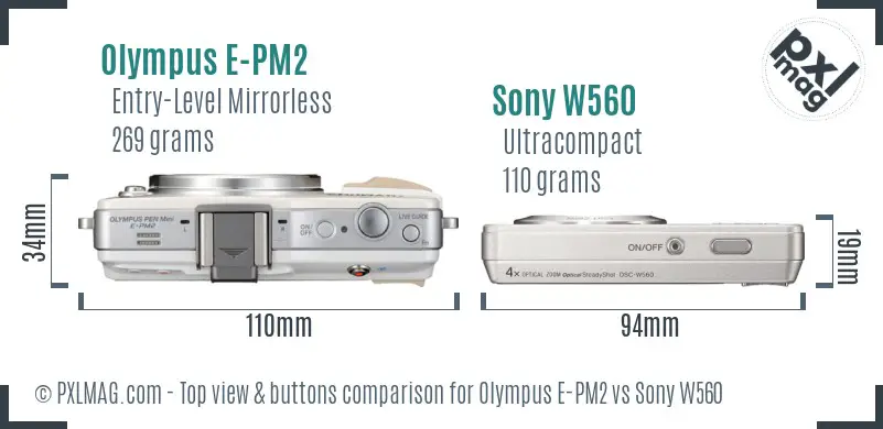 Olympus E-PM2 vs Sony W560 top view buttons comparison Olympus E-PM2 vs Sony W560 top view buttons comparison