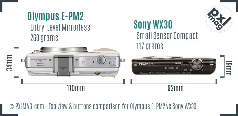 Olympus E-PM2 vs Sony WX30 top view buttons comparison Olympus E-PM2 vs Sony WX30 top view buttons comparison