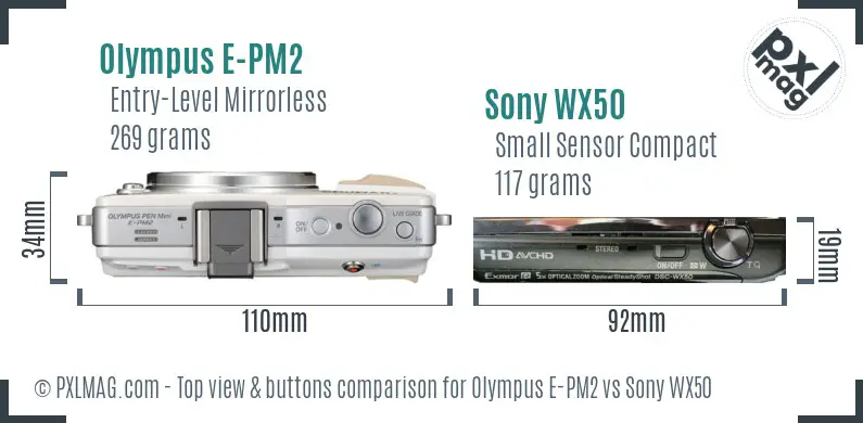 Olympus E-PM2 vs Sony WX50 top view buttons comparison Olympus E-PM2 vs Sony WX50 top view buttons comparison