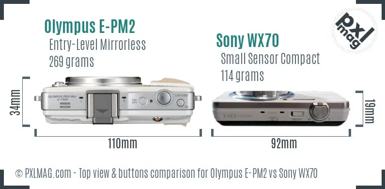 Olympus E-PM2 vs Sony WX70 top view buttons comparison Olympus E-PM2 vs Sony WX70 top view buttons comparison