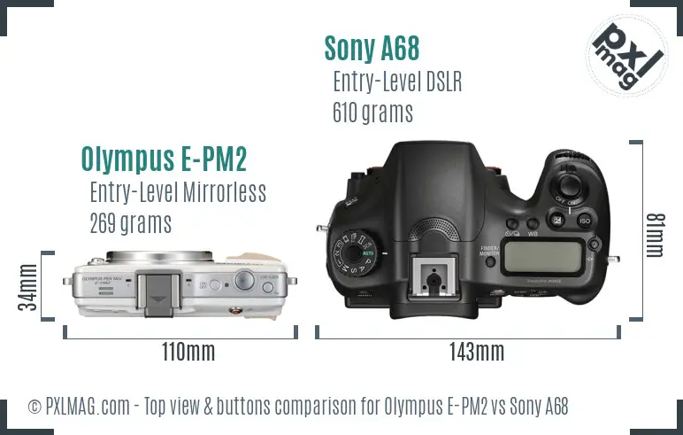 Olympus E-PM2 vs Sony A68 top view buttons comparison Olympus E-PM2 vs Sony A68 top view buttons comparison