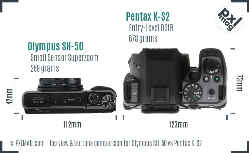 Olympus SH-50 vs Pentax K-S2 top view buttons comparison