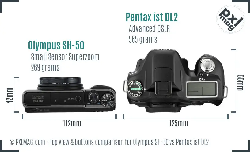 Olympus SH-50 vs Pentax ist DL2 top view buttons comparison
