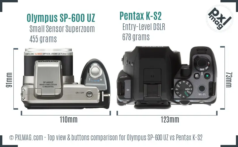 Olympus SP-600 UZ vs Pentax K-S2 top view buttons comparison