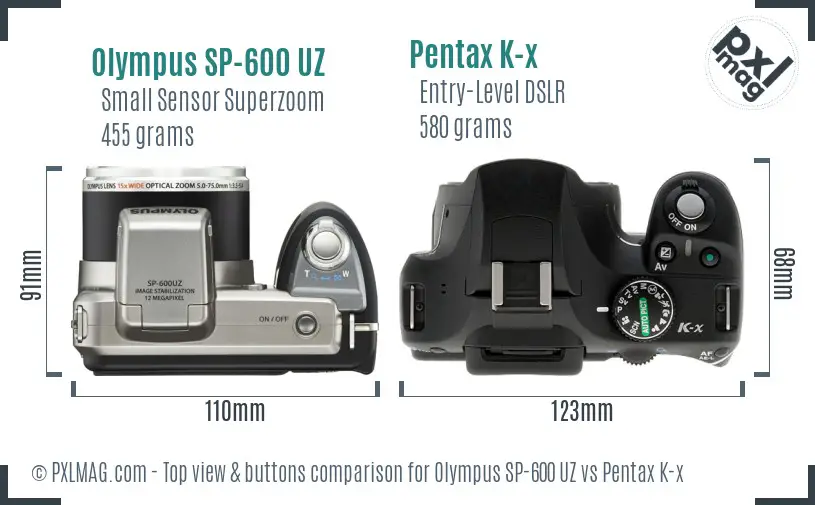 Olympus SP-600 UZ vs Pentax K-x top view buttons comparison