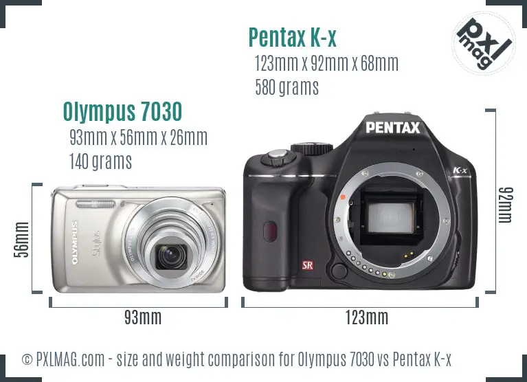 Olympus 7030 vs Pentax K-x size comparison