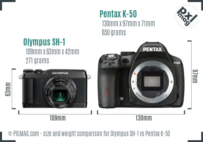 Olympus SH-1 vs Pentax K-50 size comparison