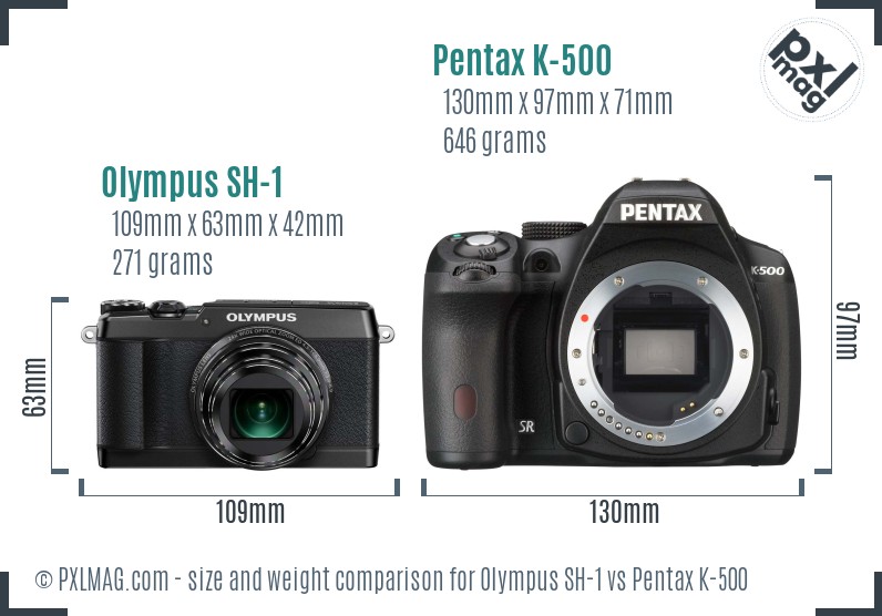 Olympus SH-1 vs Pentax K-500 size comparison