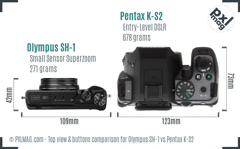 Olympus SH-1 vs Pentax K-S2 top view buttons comparison