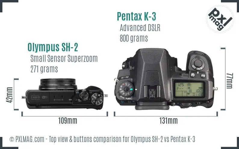 Olympus SH-2 vs Pentax K-3 top view buttons comparison
