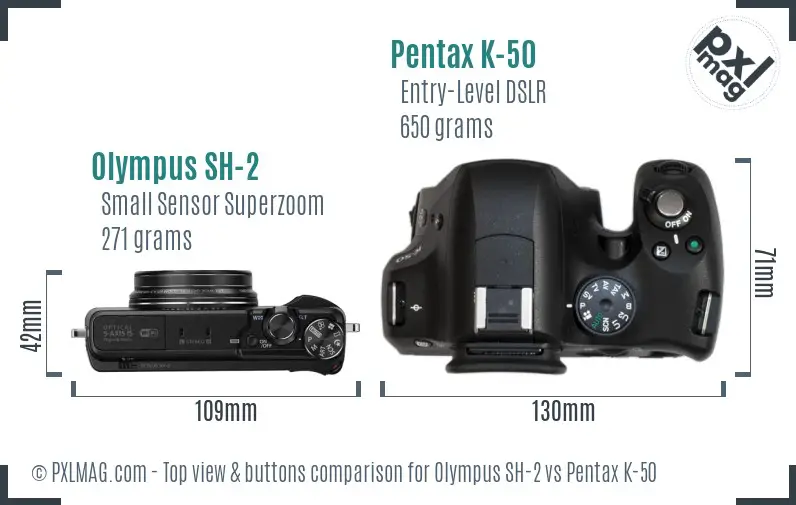 Olympus SH-2 vs Pentax K-50 top view buttons comparison