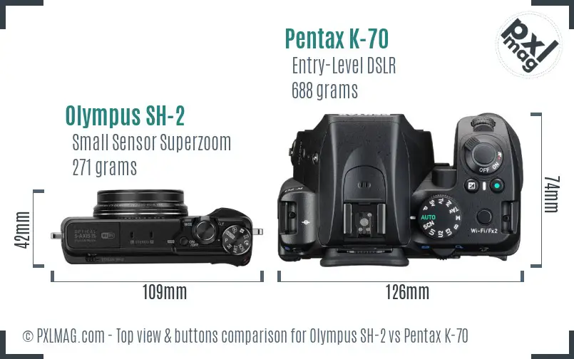 Olympus SH-2 vs Pentax K-70 top view buttons comparison
