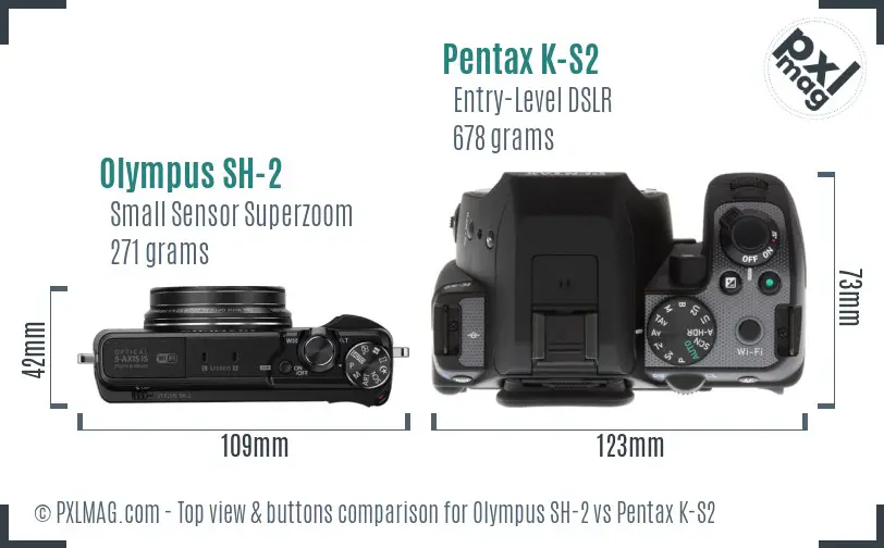 Olympus SH-2 vs Pentax K-S2 top view buttons comparison