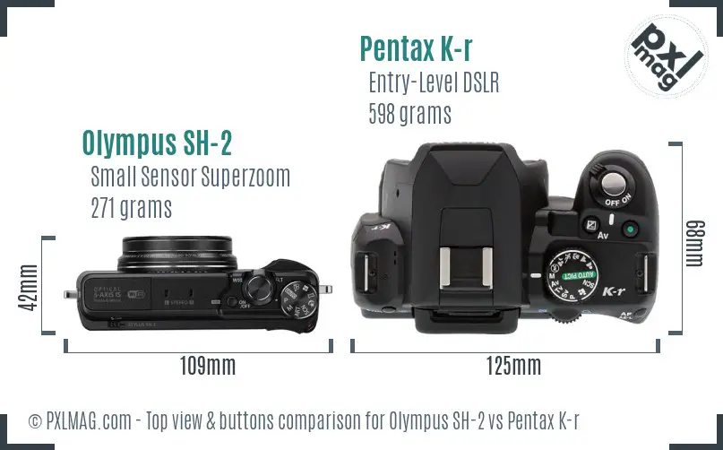 Olympus SH-2 vs Pentax K-r top view buttons comparison