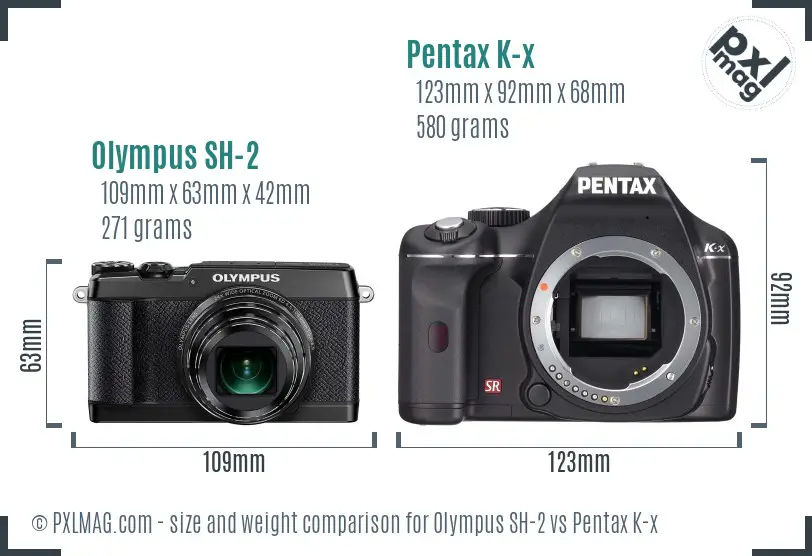 Olympus SH-2 vs Pentax K-x size comparison