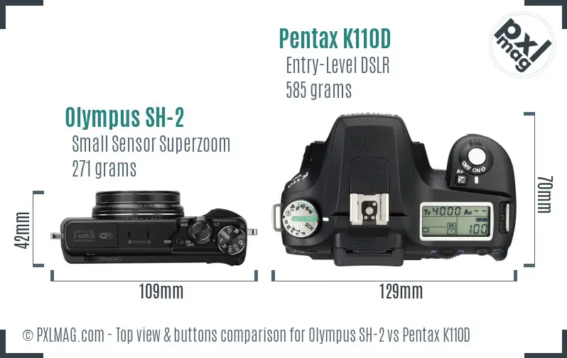 Olympus SH-2 vs Pentax K110D top view buttons comparison