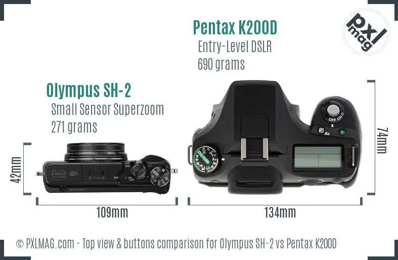 Olympus SH-2 vs Pentax K200D top view buttons comparison