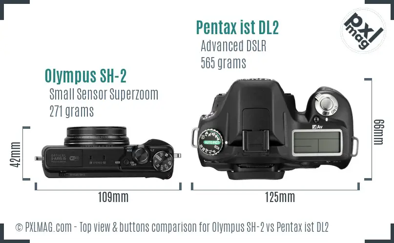 Olympus SH-2 vs Pentax ist DL2 top view buttons comparison