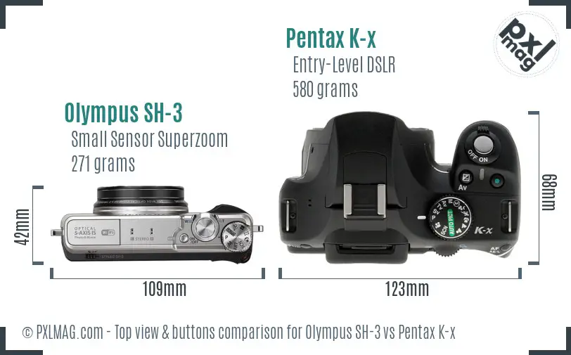 Olympus SH-3 vs Pentax K-x top view buttons comparison