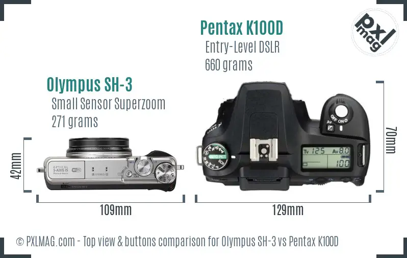 Olympus SH-3 vs Pentax K100D top view buttons comparison