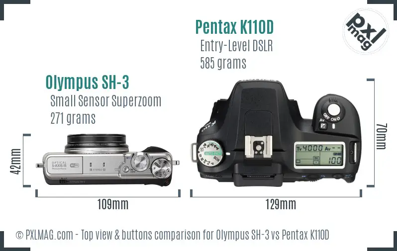 Olympus SH-3 vs Pentax K110D top view buttons comparison