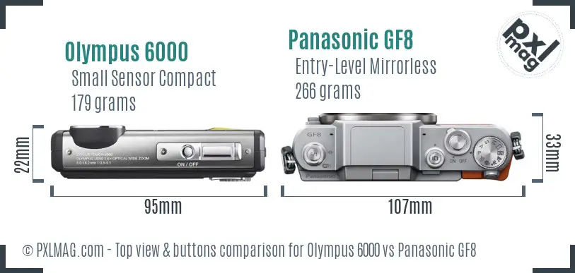 Olympus 6000 vs Panasonic GF8 top view buttons comparison Olympus 6000 vs Panasonic GF8 top view buttons comparison