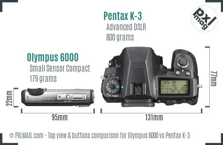 Olympus 6000 vs Pentax K-3 top view buttons comparison