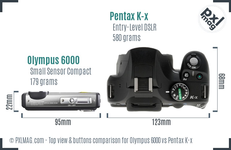 Olympus 6000 vs Pentax K-x top view buttons comparison