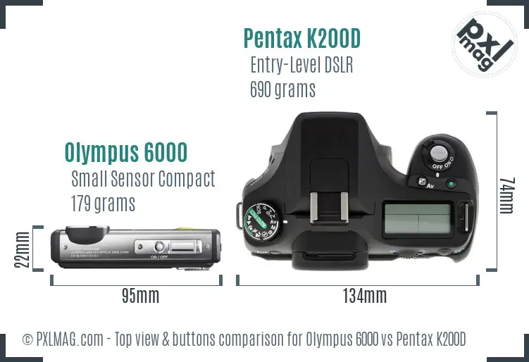 Olympus 6000 vs Pentax K200D top view buttons comparison