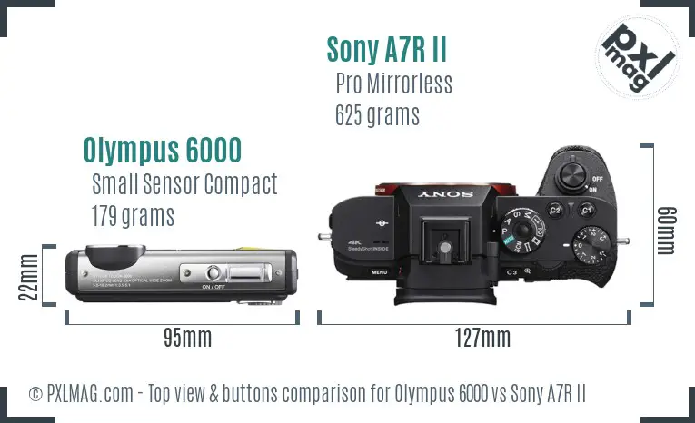 Olympus 6000 vs Sony A7R II top view buttons comparison