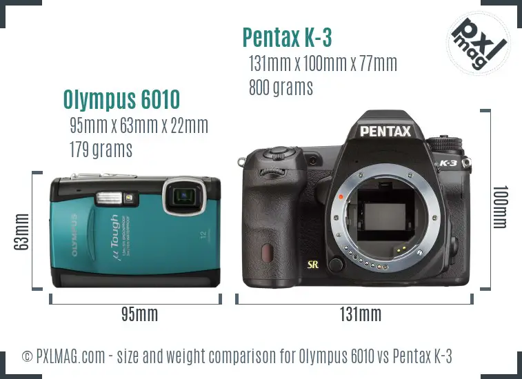 Olympus 6010 vs Pentax K-3 size comparison
