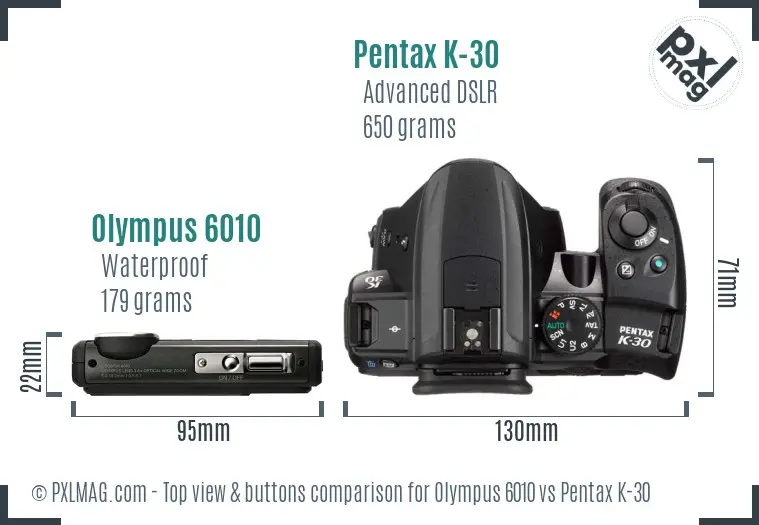 Olympus 6010 vs Pentax K-30 top view buttons comparison