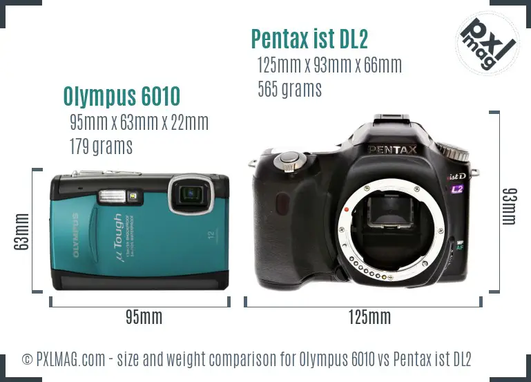 Olympus 6010 vs Pentax ist DL2 size comparison