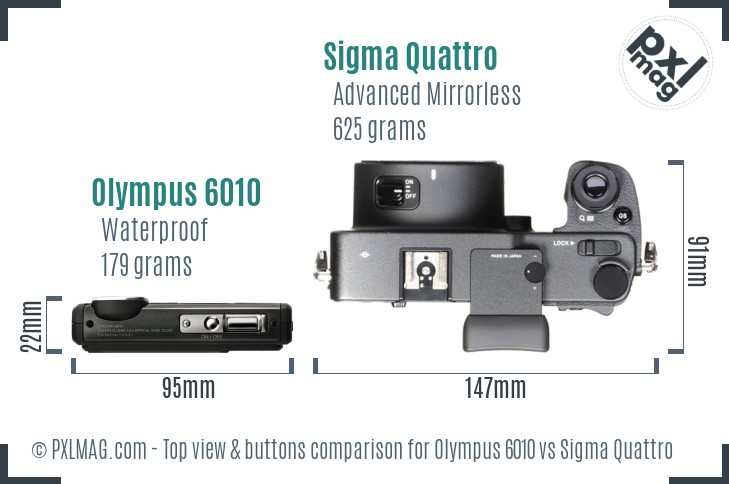 Olympus 6010 vs Sigma Quattro top view buttons comparison
