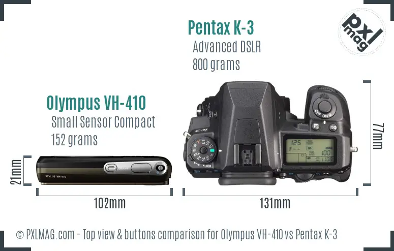 Olympus VH-410 vs Pentax K-3 top view buttons comparison