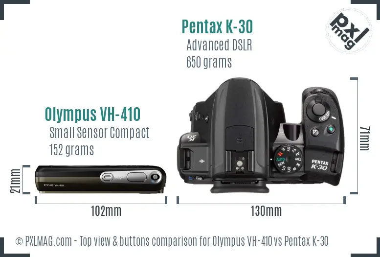 Olympus VH-410 vs Pentax K-30 top view buttons comparison