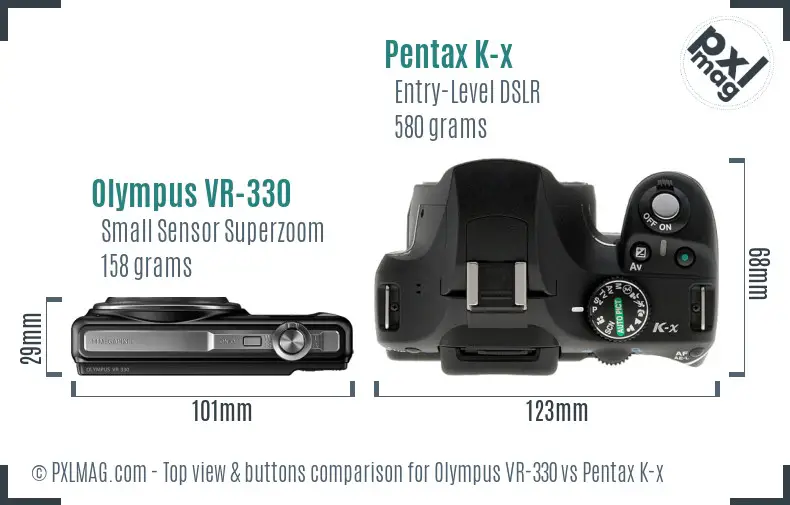 Olympus VR-330 vs Pentax K-x top view buttons comparison