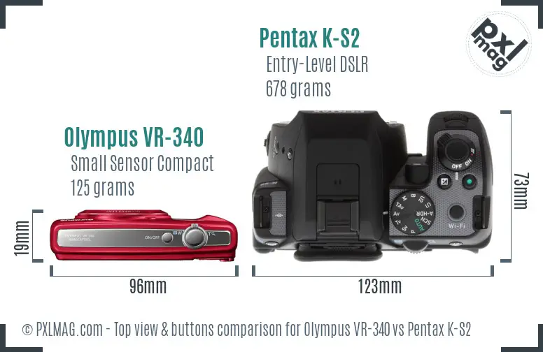 Olympus VR-340 vs Pentax K-S2 top view buttons comparison