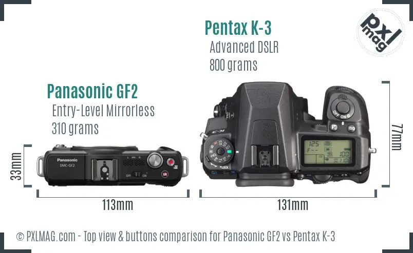 Panasonic GF2 vs Pentax K-3 top view buttons comparison