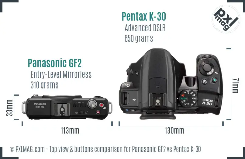 Panasonic GF2 vs Pentax K-30 top view buttons comparison