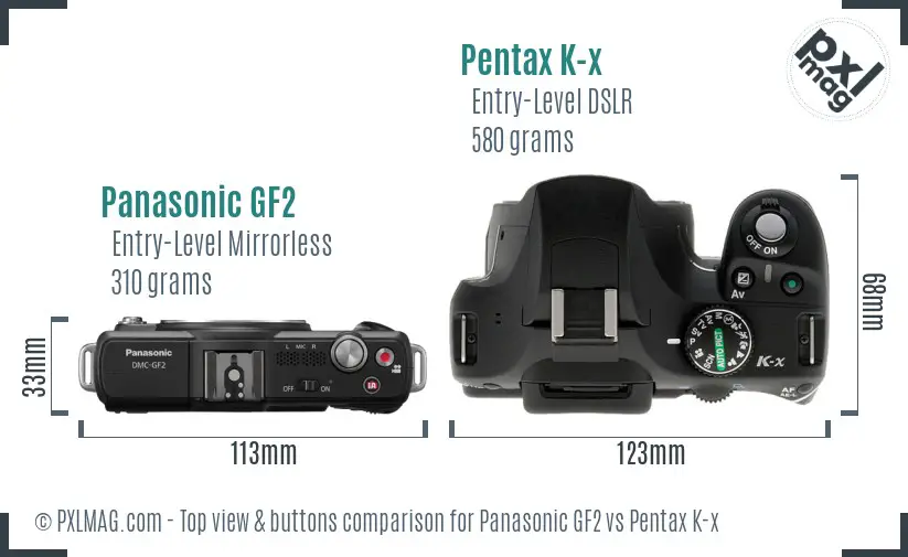 Panasonic GF2 vs Pentax K-x top view buttons comparison
