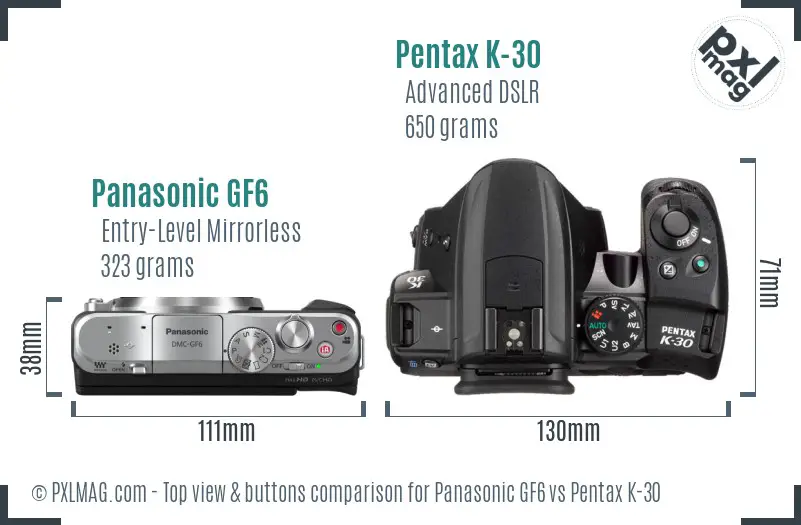 Panasonic GF6 vs Pentax K-30 top view buttons comparison