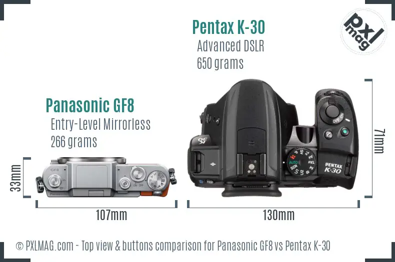 Panasonic GF8 vs Pentax K-30 top view buttons comparison