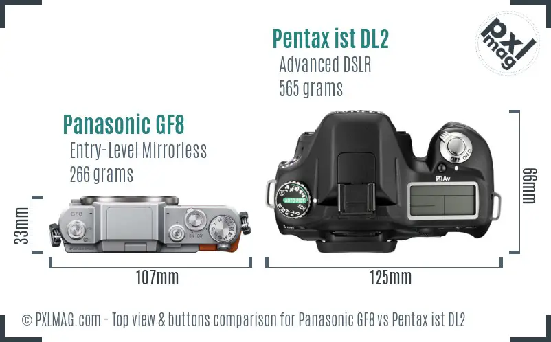 Panasonic GF8 vs Pentax ist DL2 top view buttons comparison