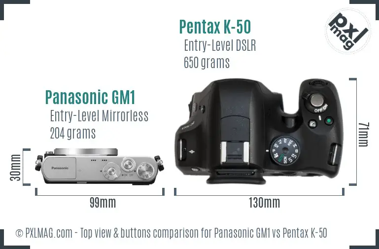 Panasonic GM1 vs Pentax K-50 top view buttons comparison