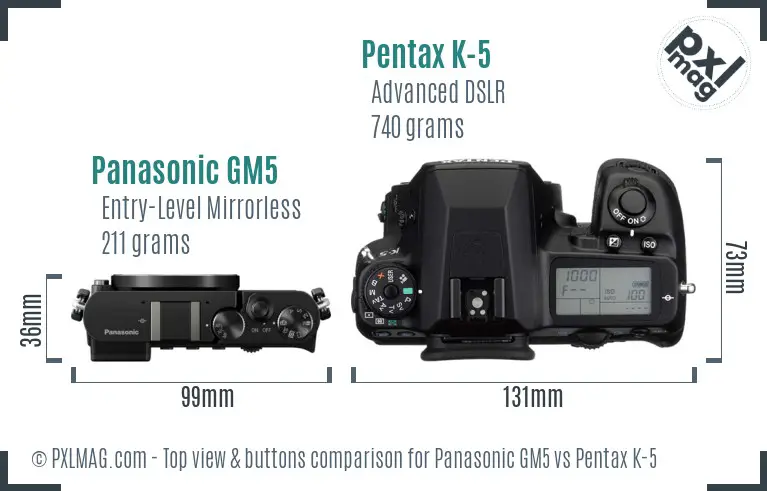 Panasonic GM5 vs Pentax K-5 top view buttons comparison